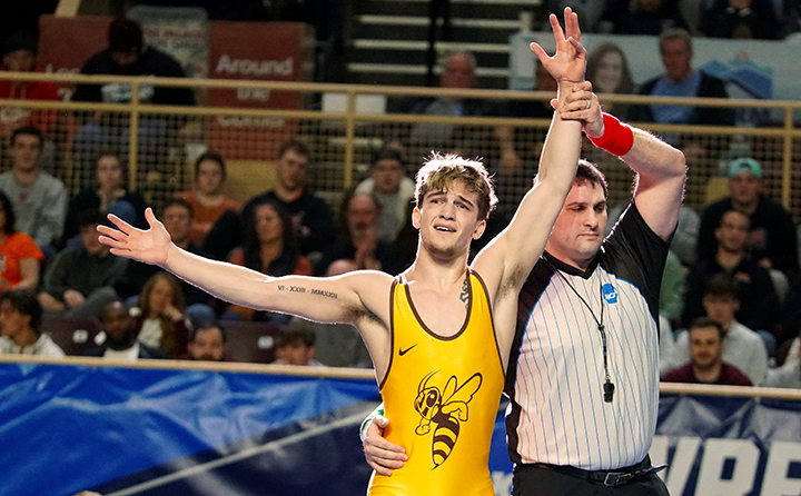 photo of Michael Petrella wrestling champ